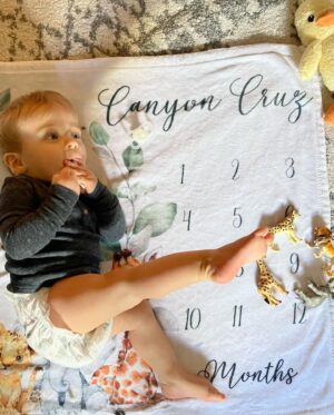 Ciara Hanna Instagram - 9 MONTHS IN AND NOW 9 MONTHS OUT 👊🏻!!! 
Happy 9 months to our little Canyon Cruz. 
He has 2 bottom teeth now, saying mamamamama and dadadada but has no idea what they mean hahah. 
OUR LITTLE MONKEY IS SUPER ACTIVE AND NEVER STOPS MOVING 🏃🏼. 
Stubborn, curious and looooooooooves Blues Clues more than anything. 
I love you binky tink 💙