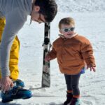 Cindy Poumeyrol Instagram - Petit séjour ski en famille à @baqueira_beret Pour les ref que l’on m’a demandé : Ma combi @colmaroriginals Combi chien Suzanne @tinycottons Manteau Victoire et sweat Ski club @petitbateau Lunettes soleil @izipizi Casque @cairnsport_official Couvre casque Licorne 🦄 outdoorxl Publicité (achats perso)