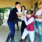 Claire Forlani Instagram - #blackbeauty #filming I Made them Do IT! @calamlynch & @fern_deacon & #IainGlen Iain wishes he wasn’t there, I’m doing some weird aerobic move, Calam & Fern are always like that 🐎🐎