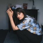 Clara Luciani Instagram - Oh les beaux jours …! 🌹C’était quand même vachement bien cet été avec vous, la guitare en bandoulière et l’appareil photo autour du cou…! Bon courage pour la rentrée. 📸 (Ps : cherchez les Curly)