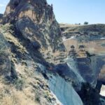 Clare Waight Keller Instagram - After Istanbul the valleys of Cappadocia - what I didn’t do was go in a balloon which is what most people do - what I did do was hike valleys and rocks and discover this incredible place on foot. 1. Gérôme National Park 2. See at the end the most remote cafe I’ve ever been to 3. Fall in the desert 4. Remote refreshments fresh pomegranate juice with a spectacular view 5. @uniqlo :C white shirt with @uniqlo U men’s cargo pants 6/7. Out in the valley 8/9 Room with a view at sunrise 10 The Chimneys #travel #memories #inspiration #turkey #cappadocia #remote #life #restaurant #goals