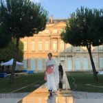Clare Waight Keller Instagram - The next couture chapter was Caraman - I named this collection after the 19th century townhouse originally built for the Duke of Caraman. This beautiful building became the Haute Couture atelier and salon of Hubert de Givenchy, where it still remains today on Avenue George V. I think for many people this was one of those shows that really resonated deeply with the story of Givenchy. It was a moment that really struck a very emotional chord with the audience and my team backstage, particularly as it was so soon after both the Royal Wedding and Hubert’s death. I had always personally felt that the Givenchy archives were a mystery, rarely seen in public exhibitions nor books despite his extraordinary contributions to fashion in film and the history of fashion in celebrity culture. I felt a profound connection to his craft as I searched through his legacy to honour his life through this show. I wanted to capture the essence of his work and vision of women through my own lens. In the images here - the looks hanging in the Couture salon, the show venue in the Musée de Archives garden in the heart of the Marais on a stunning summer evening, rehearsals in the afternoon before the show with the production team still finishing the set up, whilst I’m listening to the music to set the pace of the models. #hautecouture #paris #fashion #style #audreyhepburn #givenchy