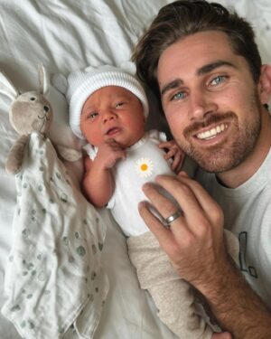 Cleo Massey Instagram - Our first week with Indigo 🌼💜
1. My latest fav photo. Luke was born to be a girl Dad. 💕
2. Little koala squish. Been soaking up these cuddles. 🐨
3. Crumpet taking big sister duties very seriously. (She is so gentle and curious, it’s very cute.) 
4. Still so cute when sad. 🤣
5. First cafe outing was had! And was a success.
6. Caught her smiling. 🥹
7. First fam photo on Easter Sunday 🐣
8. Another smile, you are so loved baby Indi! 
9. Two day post birth sushi platter from . Absolutely guzzled it. 🍱