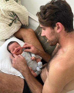 Cleo Massey Instagram - Our first week with Indigo 🌼💜
1. My latest fav photo. Luke was born to be a girl Dad. 💕
2. Little koala squish. Been soaking up these cuddles. 🐨
3. Crumpet taking big sister duties very seriously. (She is so gentle and curious, it’s very cute.) 
4. Still so cute when sad. 🤣
5. First cafe outing was had! And was a success.
6. Caught her smiling. 🥹
7. First fam photo on Easter Sunday 🐣
8. Another smile, you are so loved baby Indi! 
9. Two day post birth sushi platter from . Absolutely guzzled it. 🍱
