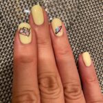 CoCo Lee Instagram – My top pick for nail color for the hot summer that goes with everything is –  pale yellow with sassy art.  What color do u think is hot for the summer? #nails #summer #chic