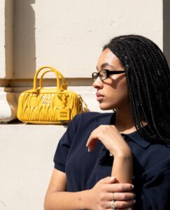Coco Rebecca Edogamhe Instagram - @miumiu got me feeling like 🤓🫶🏽💼⭐️ 📸: @valeciampi #miumiu #miuwander #adv