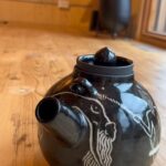 Colby Minifie Instagram - 🪐 My first ever tea pot! 🪐 Now I just need a handle and some naked ladies to join me for a tea party. Thanks for housing me so warmly in Toronto @claywithme! And check out @michelle_wen_artist if you wanna see the real scraffito master that inspired this design!