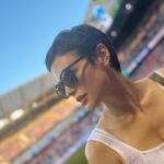 Conor Leslie Instagram - Went to my first football match yesterday and watched @premierleague play stateside (I know I’m the American here but “football” makes more sense and “soccer” doesn’t but hey, a lot of things don’t make sense to me over here) Also: this month was the first time I found out what it’s like not needing to always have an emergency hair tie on my wrist at all times: very freeing. A summer of firsts ✔️ 📷 by @carolineroses aka that really fun friend you bring to a football match who will split time between chatting but also *actually watching* the game 🤝