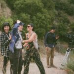 Courtney Barnett Instagram – Full-length visual accompaniment for End Of The Day directed by @oclaire available to watch now at the link in my bio. Huge thanks to this amazing film crew 💙💙💙
Director – Claire Marie Vogel
Producer – Annika Dawson
Set Producer – Lily Darragh 
Director of Photography – Tim Toda
Editor – Mitch Goldberg
Colorist – Taylor Black
Hair & Makeup – Leticia Llesmin
PA/CC – Mallory Lemieux
Camera Assist – Ethan Smith
Camera PA – Brayden smith
PA – Spencer Brown
Color Producers – Christina Caldwell   Stefanie Schaldenbrand at Apache
Filmed in Tujunga, California on Tongva land.
Photos by Claire Vogel, Leticia Llesmin, Mallory Lemieux, Ethan Smith & me.
