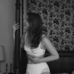 Courtney Halverson Instagram - ad 🥐 When lingerie meets boulangerie. 🥐 No, it’s not a real word, but it probably should be. Why get flaky crumbs all over your clothing when you could instead indulge in your ‘boulingerie’. And what better lingerie to wear when enjoying a buttery croissant than @simoneperele_america, who makes equally buttery soft sets like this one. Perfectly comfortable, with an attention to detail and construction that makes it my absolute favorite lingerie to reach for. Highly recommend giving their collection a perusal, but as a note : the croissant is not included. . . . #boulingerie #wordsthatshouldexist #romanticstyle #alafrancaise #frenchgirl #dreamymoments | filmed at the beautiful @chateau_marcellus