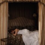 Courtney Halverson Instagram - Please adjust your expectations accordingly. ☁️ ☁️ ☁️ Sharing this mostly as satire as today is anything but a ‘do not disturb’ day - today marks two completely exhilarating career highs. The first being that today is the last day to get your hands on my locket collection with @monicarichkosann (the one I’ve paired here with a sheet and very little else). Creating this collection of shell themed lockets alongside MRK was an absolute dream come true, and still feels like a complete pinch me moment. The second exciting bit of news here at PLF HQ (aka my living room) is that my small brand (@maisonmiette) is launching our third collection of silk scarves, lovingly dubbed The Apéro Collection. It’s a launch that has been in the works for about a year now, and it is so surreal to see it come to fruition. A massive thank you to the team at @_storiesstudio for helping bring the vision to life. I cannot wait for you to shop this collection of both 20 inch and 36 inch silk scarves - perfectly ready to join you on your warm weather adventures. My ‘do not disturb’ era will have to wait a little while. ☁️ . . . #romanticstyle #donotdisturbera #vintagevibes #feminineenergy | shot at the one and only @ashfordcastle