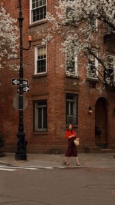 Courtney Halverson Instagram - It really is the best time of the year 🧺🥀🧋 Put on a cute outfit and I’ll be outside your door in 20 minutes, let’s go! Wearing my uniform for the season which includes a floral midi skirt (groundbreaking) with a little cardigan (in case it’s chilly) and a basket (to put my flowers and little treats in). All from @sezane, of course 🥀 . . #feminineenergy #sezanelovers #parisianstyle #romanticstyle #basketpurse | gifted pieces featured