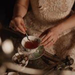 Courtney Halverson Instagram - But that’s just the trouble with me. I give myself very good advice, but I very seldom follow it. 🫖 Had this absolutely beautiful tea in this gorgeous salon at @ashfordcastle (all to ourselves) and felt just a little like Alice in Wonderland. What an absolutely surreal and gorgeous experience and one that I had to create a little magic to share with you here. And now (because I love a little drama) is it clotted cream and *then* jam on your scone, or jam first and then clotted cream? Please feel free to argue (in a friendly tone!) in the comments. . . . . #teatime #aliceinwonderland #feminineenergy #romanticstyle #romanticizeyourlife ps : Thank you Ashford for letting me play and thank you Eric for not minding when I asked to take 500 photos of the experience before getting to properly enjoy the tea as well.