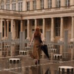 Courtney Halverson Instagram – The rain is very important, because that’s when Paris smells it’s sweetest 🌧️ It’s not just the petrichor (the word for the smell of rain) – thanks to Audrey Hepburn I know why the rain is particularly lovely smelling in Paris – “It’s because of the damp chestnut trees, you see?” 

What about you, do you love the smell of rain? Are you a pluviophile too? 🌧️ 
.
.
.
#paris #rainyday #petrichor #romanticstyle #parisianstyle #feminineenergy #pluviophile | wearing @lelarose & @sezane