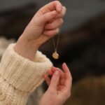 Courtney Halverson Instagram - Maybe I watched Annie a little too many times as a child, but to me there has always been something so beautiful and so nostalgic about a locket. A secret little treasure box that you can wear around your neck, a place to hold memories and to keep them close to your heart. I cannot express how thrilling it has been to launch this small collection of lockets with @monicarichkosann. The amount of messages and texts and congratulations has been so surreal - and it’s a bit of a “pinch me” moment. I’ve long since admired MRK pieces and when the idea came about to create a collection (alongside Monica herself) I said yes immediately. My first thought, as the collection came to life, was to photograph the pieces in Ireland - I still can’t believe it came true This collection means so much to me, and the shell shape was inspired by the feeling of walking along a beach, finding little hidden treasures, buried in the sand. If you’re as much of a hopeless romantic as I am, then please know these lockets were made with you in mind. ps : as of right now, the collection (in both sterling silver as well as 18k gold) is available now through April, and hopefully beyond then. 🐚 . . . . #ronanticstyle #locketnecklace #lockets #feminineenergy #ireland