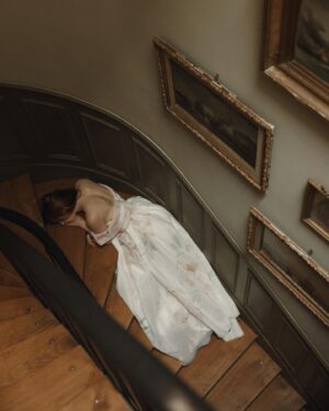 Courtney Halverson Instagram - At this hearing, I stand before my fellow members of the Tortured Poets Department with a summary of my findings. 🗝️🥀 ✉️

Forever a bleeding heart romantic, forever choosing the most heart-wrenching songs & poems & movies, and forever a little bit dramatic, so this felt like a fitting moment. Captured this drama on the staircase of the house we’re staying in in Paris and you better believe I will be listening to ttpd on the metro today. 

Are you listening too? 
.
.
.
#ttpd #thetorturedpoetsdepartment #romanticstyle #paris #feminineenergy | wearing @milla at a @onefinestay property.