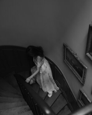 Courtney Halverson Instagram - At this hearing, I stand before my fellow members of the Tortured Poets Department with a summary of my findings. 🗝️🥀 ✉️

Forever a bleeding heart romantic, forever choosing the most heart-wrenching songs & poems & movies, and forever a little bit dramatic, so this felt like a fitting moment. Captured this drama on the staircase of the house we’re staying in in Paris and you better believe I will be listening to ttpd on the metro today. 

Are you listening too? 
.
.
.
#ttpd #thetorturedpoetsdepartment #romanticstyle #paris #feminineenergy | wearing @milla at a @onefinestay property.