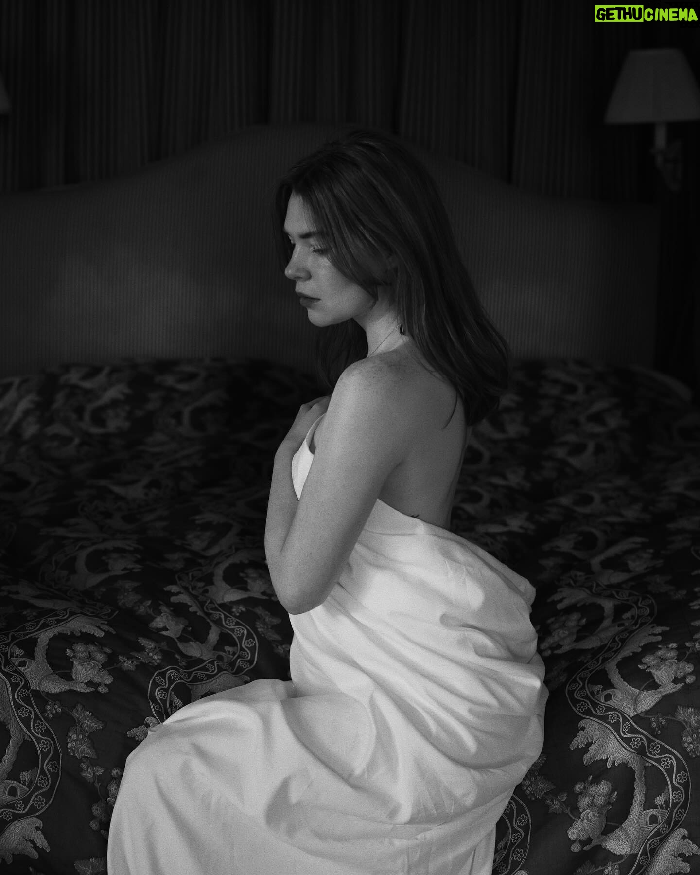 Courtney Halverson Instagram - I had a box of costumes as a child, and it was easily my favorite activity. Old scarves became skirts, tied haphazardly around my waist, a scrap of fur salvaged from a vintage coat acted as a stole draped across my shoulders, and a patterned blanket was transformed in my eyes to a cape. With this box of odds and ends, I found it easy picture characters (each a little extravagant) off on some grand adventure. I craved a world of fantasy - which if I think about it I suppose that’s in some way how I’ve ended up here. Creating photos and cinematic moments that each feel like their own little world, where I can (in a different way) play a character. And while some of my imagination has become reality, it’s nice to know that all these years later I can still drape myself in a sheet and make believe that it’s a ballgown. . . . #romanticstyle #elegantstyle #cinematic #feminineenergy . . Shot at the exquisite @ashfordcastle 🤍
