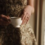 Courtney Halverson Instagram - I am forever in awe of beautiful old things - antiques, vintage clothing, and especially architecture from bygone eras. I think it’s because it reminds me that there is a connecting thread throughout the years, reminding me that so many other have walked where I walk, have held the same objects, even worn the same clothing. And here I am, all these years later, standing in awe of the beauty of a space that was once brand new. A space that someone had ceilings carved for and paint chosen and created a space that hundreds of years later leaves me in awe. The beauty of a space that not only endures but transports me through time - like this gorgeous room where I was lucky enough to have tea while in Ireland. It’s less than an hour from Dublin at the gorgeous @cartonhouse.fairmont, and feels just a bit like stepping back in time. Would you have tea in this space? And if so, would you like one lump of sugar or two? 🫖 . . . #romanticstyle #cinematicmoments #feminineenergy #vintagevibes @fairmonthotels