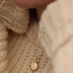 Courtney Halverson Instagram - Maybe I watched Annie a little too many times as a child, but to me there has always been something so beautiful and so nostalgic about a locket. A secret little treasure box that you can wear around your neck, a place to hold memories and to keep them close to your heart. I cannot express how thrilling it has been to launch this small collection of lockets with @monicarichkosann. The amount of messages and texts and congratulations has been so surreal - and it’s a bit of a “pinch me” moment. I’ve long since admired MRK pieces and when the idea came about to create a collection (alongside Monica herself) I said yes immediately. My first thought, as the collection came to life, was to photograph the pieces in Ireland - I still can’t believe it came true This collection means so much to me, and the shell shape was inspired by the feeling of walking along a beach, finding little hidden treasures, buried in the sand. If you’re as much of a hopeless romantic as I am, then please know these lockets were made with you in mind. ps : as of right now, the collection (in both sterling silver as well as 18k gold) is available now through April, and hopefully beyond then. 🐚 . . . . #ronanticstyle #locketnecklace #lockets #feminineenergy #ireland