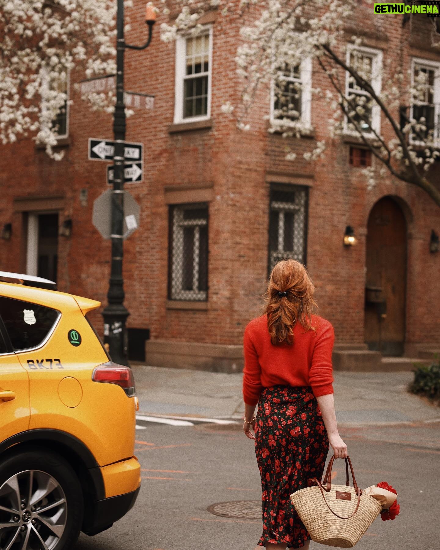 Courtney Halverson Instagram - Please consider this my love letter to spring in NYC. This is only my third spring since swapping California for the east coast and in many ways it feels like the third spring I’ve ever experienced in my life. The way the flowers appeared on the trees right when it felt like I needed them most; right when I very nearly doubted that spring would ever return after the slow down of winter. The trees and the flowers and the taxis and the birds and the neighborhoods - all of it a beautiful jumble together that I very much missed. Have you visited NYC in the spring? And did you fall in love with it too? 🚕 . . . Wearing head to toe @sezane as captured by @krystal_bick | #feminineenergy #sezane #nycspring #romanticstyle #cinematicmoment