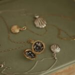 Courtney Halverson Instagram - Maybe I watched Annie a little too many times as a child, but to me there has always been something so beautiful and so nostalgic about a locket. A secret little treasure box that you can wear around your neck, a place to hold memories and to keep them close to your heart. I cannot express how thrilling it has been to launch this small collection of lockets with @monicarichkosann. The amount of messages and texts and congratulations has been so surreal - and it’s a bit of a “pinch me” moment. I’ve long since admired MRK pieces and when the idea came about to create a collection (alongside Monica herself) I said yes immediately. My first thought, as the collection came to life, was to photograph the pieces in Ireland - I still can’t believe it came true This collection means so much to me, and the shell shape was inspired by the feeling of walking along a beach, finding little hidden treasures, buried in the sand. If you’re as much of a hopeless romantic as I am, then please know these lockets were made with you in mind. ps : as of right now, the collection (in both sterling silver as well as 18k gold) is available now through April, and hopefully beyond then. 🐚 . . . . #ronanticstyle #locketnecklace #lockets #feminineenergy #ireland