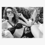 Courtney Henggeler Instagram - Me: “I’d never post a bikini picture on social media” Also me: “But what if there are cats involved?” In honor of my new @caddis_life sunglasses please enjoy these rare and not at all weird photos of me in a bathing suit. With cats. Cats. They’re like backup dancers. But cats. And thank you @caddis_life for helping me read perfectly normal sized print that has now eluded me in my old age.😍