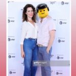 Courtney Henggeler Instagram - My husband prefers me not to post his picture on social media. I suspect it has to do with the 11 unsolicited dick pics he received from overly enthusiastic Cobra Kai fans in Denmark. Or maybe he has another wife who’s super active on Instagram and then, well I guess the jig is up. Regardless, I had to post how stinkin proud I am of this guy. We’ll call him, Chad. Since he doesn’t like me tagging him in posts either. And is seemingly unaware if you just google “Courtney Henggeler’s husband” he’ll pop up. So will a picture of Jordan Knight. But that’s my own doing. The point is, Chad here produced this wonderfully weird movie that I’m just crazy about that premiered at @tribeca and he’s the shit. I love you Chad and I love @happily_movie. And fine, I love Jordan Knight. There. I said it. Also I love @bdgrabinski but the amount of men I’m confessing my love for in this post feels vaguely inappropriate. So I’ll just say, you’re cool.