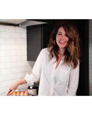 Courtney Henggeler Instagram - This morning’s post is brought to you by eggs. 
Eggs for breakfast, lunch and photo shoots without pants. 
Eggs, a great source of protein and also hilarious. 
If you don’t believe me look at that second slide. 
See that? I making eggs and laughing. Hilarious. 

Disclaimer:
*@peteandgerrys did not ask me to pose in my underwear to promote their eggs. 
@veryvness did. 
And I do whatever Vanessa tells me. 
In fact Pete and Gerry have never even heard of me and most likely would want me to stop posing without pants near their products. 
But alas, here we are. 

 📸 @curtyphotog 
👔: @sezane 
@bluebella 
🍳: @peteandgerrys