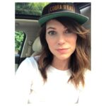 Courtney Henggeler Instagram - Sometimes I like to start my week by shuffling around Whole Foods with @cobrakaiseries gear, trying to incite violent, produce aisle karate battles. Or conversation. Honestly either way I consider it time well spent. Then of course, get in my car and take a dead serious selfie about it. 🥬🌶🍉🍍🥦
