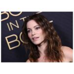Courtney Henggeler Instagram - And now, my impression of a sexy banana🍌 @boysintheboatmovie in theaters Christmas Day 🛶 🎄 Sexy banana available for your next bat mitzvah or nursing home sing-a-long