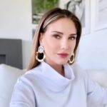 Daisy Fuentes Instagram - 🤍 Saturday night vibes 🤍 Statement earrings, lux sweatshirt & 💄 @daisyfuentesstyle 🤍