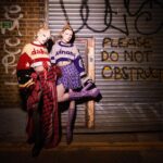Dakota Schiffer Instagram – 011: pretty in punk
‘❤️dakota x winona 💜’

hand knitted jumpers- @winona.schiffer 
skirts- @rowcreativestudio 
hair- @mizvaseline 
photo- @amarriedcouple 

THE jumper!! A Marc Jacobs Heaven meets Vivienne Westwood fusion was our interpretation of the punk theme! This was my most sentimental runway look and of course it was one of the last runway categories! Winona painstakingly hand knitted this jumper for me while also writing her own dissertation and dealing will all my copious pre drag race meltdowns and last minute decision making. Not getting to wear this on the runway was the most heartbreaking aspect of being eliminated, so as soon as I was, I ran to go put it on so the world got to see the weeks and weeks of work that went into this look! Winona made herself a matching jumper to go with mine over the summer and I couldn’t be more pleased with how these looks turned out! 💜❤️