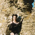 Dakota Schiffer Instagram – 002: BBC keepin’ it 100
‘terrible tudors’

photos- @goldie.wixon @winona.schiffer and @beccabowiee 
outfit- @narclsslsm 

so nervous to get back into these outfits but this shoot and climbing up this giant wall in golden hour really made me fall in love with this look again!