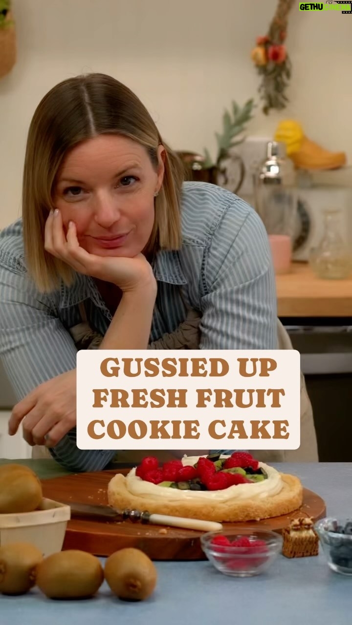 Damaris Phillips Instagram - I make these when someone says they don’t like cake… Do you have any of those people in your life? Fresh Fruit Cookie Cake Ingredients: 1 package of premade sugar cookie dough 8 ounces cream cheese, room temperature 4 tablespoons honey 2 1/2 cups fresh fruit (strawberries, kiwi, blueberries, mangos, raspberries…) Instructions: Preheat your oven to 350 degrees F. Line the bottom of an 8-inch cake pan with parchment paper. Press the premade cookie dough evenly into the bottom of the prepared cake pan to form a cookie crust. Bake the cookie crust in the preheated oven until it’s golden brown, about 22-27 minutes. Let it cool completely. In a small bowl combine the cream cheese and honey. Stir until smooth. Spread the mixture evenly over the cooled cookie crust. Arrange the fresh fruit on top of the cream cheese mixture. Chill the cookie cake in the refrigerator for at least an hour before serving.