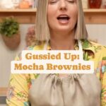 Damaris Phillips Instagram - Are you a midnight snack person??? You can also add instant espresso powder or coffee to a box brownies mix as a quick and easy gussied up move! Mocha Brownies Ingredients: 10 tablespoons unsalted butter, cubed 1 cup sugar  3/4 cup cocoa powder  1 teaspoon instant espresso   2 large eggs  1 teaspoon pure vanilla extract  1 teaspoon salt 1/2 cup all-purpose flour  1/3 cup dark chocolate chips Nonstick cooking spray  Powdered sugar to garnish Method: Preheat the oven to 350 degrees F. Spray an 8 x 10 nonstick pan with cooking spray and line with parchment paper. Set aside. In a heatproof bowl set over (but not in) a saucepan of gently simmering water, combine the butter, sugar, cocoa powder, and espresso powder. Stir continuously until the butter is melted and the mixture is smooth and hot to the touch, about 6-8 minutes (you can also do this in the microwave, just heat in 30 second increments, stirring after each time until melted, about 2 minutes total) Remove from the heat and stir with a silicone spatula until cool, about 2 minutes. Stir in the eggs, one at a time, and then the vanilla a d salt until the mixture gets very shiny and smooth, about 2 minutes. Fold in the flour. The batter will be very thick. Sprinkle with chocolate chips. Bake until the edges pull from the sides and the top is set, about 15-20 minutes. Cool in the pan for 15 minutes before cutting and sprinkling with powdered sugar to serve.