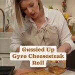 Damaris Phillips Instagram - Would these be a hit at your next party or potluck??? I’m making them this week for #derby Gyro Cheesesteak Roll Ingredients: 8 ounces precooked gyro meat, thinly sliced 1 package (about 8 ounces) frozen grilled onion and pepper blend 5-6 slices provolone cheese 4 slices American cheese 1 package crescent roll sheets 2-4 tablespoons Mayo 1 teaspoon garlic powder Salt and pepper to taste Instructions: Preheat the oven to 350 degrees F. Roll out the crescent roll sheet on a baking sheet. Spread the mayonnaise evenly on the dough. Sprinkle with garlic powder. Layer the slices of gyro meat evenly over the crescent roll sheet, leaving a small border around the edges. onion and pepper blend over the gyro meat. Lay slices of provolone and American cheese over the vegetables. Carefully roll the crescent sheet, enclosing the filling, and seal the edges. Bake in the preheated oven until the roll is golden brown, and the cheese is melted, about 30-35 minutes. Allow it to cool slightly before slicing. Enjoy!!!!