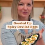 Damaris Phillips Instagram - Deviled eggs on Easter, yes or no? Spicy Deviled Eggs Recipe: Ingredients: 6 eggs, hard-boiled and peeled 3 tablespoons Dukes mayonnaise 1 to 2 tablespoons Sriracha (adjust to taste) 1 tablespoon whole grain mustard 1 teaspoon sesame oil 1/8 teaspoon salt 1/8 teaspoon freshly ground black pepper Finely chopped chives for serving Instructions: Cut the hard-boiled eggs in half lengthwise and carefully remove the yolks. In a bowl, mash the egg yolks with Dukes mayonnaise, Sriracha, whole grain mustard, sesame oil, salt, and black pepper until well combined. Spoon or pipe the yolk mixture back into the egg whites. Sprinkle finely chopped chives on top for garnish. Refrigerate until ready to serve.