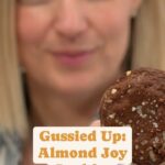 Damaris Phillips Instagram - Do you love and Almond Joy candy bar???? Almond Joy Cookies Ingredients: 1 1/2 cups choclate almond spread (you can use nutella in a pinch) 3 tablespoons brown sugar  1 egg 1 egg yolk 3/4 cup all-purpose flour 1/3 cup chopped almonds 1/3 cup coconut Flaky sea salt, for sprinkling Method: Preheat the oven to 350°F. Line two cookie sheets with parchment paper and set aside.   In the large bowl add the chocolate spread and brown sugar and fully combine using a whisk or hand mixer. Add the egg and yolk, and mix well. Add the flour and mix again. Fold in the almonds and coconut.  Divide the dough using a 1 oz portion scoop. Sprinkle with flaky sea salt. Bake until the edges of the cookies, about 8-10 minutes. Let sit for 3 minutes before transferring to a cooling rack.