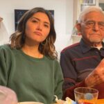 Daniella Pineda Instagram - My grandpa, Albino, just turned 99 two days ago. He wrote a book about his life called “Among The Repatriated.” Check it out, he spells my name wrong in it. His youth strangely reads to me like a PT Anderson movie (if he made a movie in the 20’s). I asked him if being insanely ridiculously good looking has kept him alive, to which he agreed. However, he also said the following… 1. Tiny ass portions. Keep it light. Don’t overeat. Since I can remember, his plate looks like a tasting platter. 2. He does not eat meat everyday. Rather, every 1-2 days. 3. SLEEP. 4. He has always looked forward to the next day, and always had his hand in multiple things. Artistic projects, public service, or being hot. 5. His mother water birthed him in the fountain of youth. #nofilter #vintagehuman #crustaceans #jurassic #antiquefeatures #hot #antiqueroadshow #oldaafuck #cavewall #archeology #BC