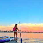 Danielle Mathers Instagram - We searching for the sun moving to the door 🌅 Time is moving on and we heading down the road 🗺 • • • • #adventureseeker #SUP #pauhana #sandiego #home #homegrown #sunset #lionsgate #paddleboarding #grateful #tbt