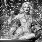 Daphne Guinness Instagram - @DaphneGuinness for the 25th Anniversary Issue, Under the Silver Moon, out now! Today, aristo-musician, model-muse, and avant-garde designer Daphne Guinness releases the music video directed by @David_LaChapelle for her single “Volcano” from her newest, yet-to-be-released album, ‘Sleep.’ This latest musical transmission distills Guinness’ life experience into a heady elixir of personal trauma, apocalyptic socio-political musings, and a takedown of late capitalism that provides a call for empathy and human connection. On the apocalyptic themes throughout the album, Guinness says, “It feels like we are living through the end of something, and it does feel like we’re in very, very strange times indeed. But I think the way through all of that is to try and make something beautiful out of it, or describe it, because there is always a way of extracting beauty out of even the ugliest thing, and that paradox is wonderful.” Read the full feature on flaunt.com! Daphne wears @DaphneGuinness catsuit, earrings, and ring. Photographed and Directed by @David_LaChapelle Styled by @ColleenAtwoodOfficial Written by @JohnPaulPryor Cinematography:@JoWillems_asc_sbc Hair Stylist: @LDMHair Makeup: @KabukiNYC Producer: @ColeenHaynes Prod Designer: Annie Sperling Stills from Video: @LucaPizzaroni Wardrobe Assist: @KoppyRight Production Co: @Maavven #FlauntMagazine #UnderTheSilverMoon #DaphneGuinness