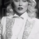 Daphne Guinness Instagram - TIME is a tapestry woven with moments of joy, trials, and the unexpected twists of fate. Today, as we unveil the culmination of countless hours, creativity, and collaboration, I’m overwhelmed with gratitude. TIME isn’t just a song—it’s a reflection of life’s dance, where every step carries meaning and every note resonates with the echoes of our shared experiences. With immense admiration and appreciation, I extend my deepest thanks to each and every one of you who have not only listened but also witnessed the visual journey crafted by my friend @david_lachapelle. This project has been a labour of love, a testament to the power of music to transcend time and connect us all. X Daphne ⏳🖤 Director: @david_lachapelle Starring: @daphneguinness Producer: @coleenhaynes Daphne Makeup: @kabukinyc Daphne Assistant: @marktmullins Daphne Archive Stylist: @alexanderfury Talent Makeup: @valli.oreilly Director of Photography: @jowillems_asc_sbc Choreography: @byrneembassy Production Designer: @213annie_sperling Costume Designer: @colleenatwoodofficial Daphne & Talent Hair: @ldmhair Talent: Prince: Jonathan Marquez Female Berliner: @babuishas Female Berliner: @guetcha Female Ingenue: @addy0g Elsa Maxwell: @mamamakeupsharon Glamorous Woman: Wendy Leon Money Patron: Jennifer Pogats Club Owner: Joseph Lopez Hollywood Charles: Hollywood Charles Gentleman 1 : William Sibley Gentleman 2: Andrew Roth Gentleman 3: Michael Henzel Showgirl: @kittendeville Showgirl Contortionist: @brynnroute Renda Pettis: Renda Pettis Dallas Perry: @whenindallas Cary Grant: Austin Craig Kelsey Patnoude: @carrotwater2.0 Cami Mcullough: @camimccullough Waiter: Tommy Pagano Ethan Haug: @ethan_haug John Byrne: @byrneembassy Luca Pizzaroni: @lucapizzaroni Jessie McCollum: @intrinsicbeautymakeup Editor: @spencersusser Colorist: @davehussey_color_co3 Online & Finishing: @skullyfx