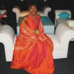 DeWanda Wise Instagram - 2016/2008. I always thought growing up & living life on my own terms was going to be amazing and nearly every day I think to myself… I WAS RIGHT, I KNEW IT!!!!! 🤣🥳 Yesterday a friend asked if I still actually love acting or if I was just going through the motions. Blessedly, miraculously, I love it more than ever. One of the most wild surprises is coming across so many artists who no longer do, and yet continue to take up space. I certainly hope more impassioned people continue to break through, find their way, and keep their peace. Cheers to the little grown lady I’ve been forever, & all the other “old souls” living the life of their dreams this wild ride of a lifetime. #Throwback {Two snaps of De in orange formal wear. First for a PR shoot in 2016, and then at a party in 2008. Never a shopper, both dresses were borrowed.}