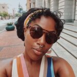 DeWanda Wise Instagram – Lately.

{De outside in a cute striped dress, shades, and earrings with her septum piercing in.

Bywater. 

A sign reads, “Beware of Ghosts.” 

My skincare routine is water, sunscreen, and minding the business that minds me.

Pizza that’s hilariously large to be on the kids menu.

A long hallway with her dog.}