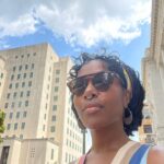 DeWanda Wise Instagram – Lately.

{De outside in a cute striped dress, shades, and earrings with her septum piercing in.

Bywater. 

A sign reads, “Beware of Ghosts.” 

My skincare routine is water, sunscreen, and minding the business that minds me.

Pizza that’s hilariously large to be on the kids menu.

A long hallway with her dog.}