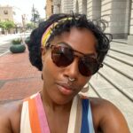 DeWanda Wise Instagram – Lately.

{De outside in a cute striped dress, shades, and earrings with her septum piercing in.

Bywater. 

A sign reads, “Beware of Ghosts.” 

My skincare routine is water, sunscreen, and minding the business that minds me.

Pizza that’s hilariously large to be on the kids menu.

A long hallway with her dog.}