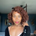 DeWanda Wise Instagram - Never underestimate the power of a light touch. See you tonight if I’m seeing you tonight. 😏💋 #ImaginaryFilm {De with a red lip, pink slip, & velvet blazer.}