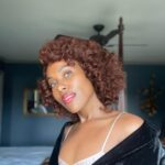 DeWanda Wise Instagram - Never underestimate the power of a light touch. See you tonight if I’m seeing you tonight. 😏💋 #ImaginaryFilm {De with a red lip, pink slip, & velvet blazer.}