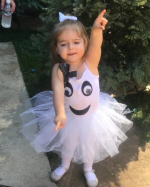 Debbie Matenopoulos Instagram - Throw back to all of Alexandra’s Halloween costumes since year one.  I have to say the Greek Yiayia is still my very favorite. Clearly it was NOT her favorite. Lol.  We even made a walker out of PVC pipe. 😂😂😂. Happy Halloween everyone. #yiayia #ghost #lamb #bumblebee #unicorn #poppytroll #princessleia